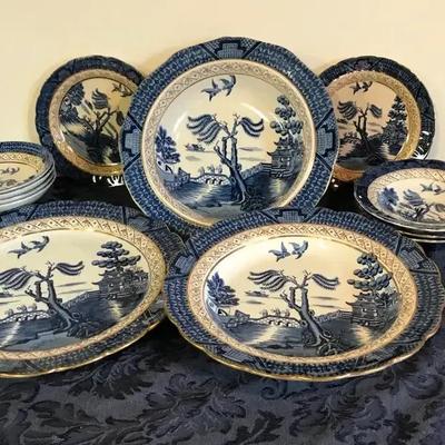 An Assortment Of Booth's Real Old Willow Dishes