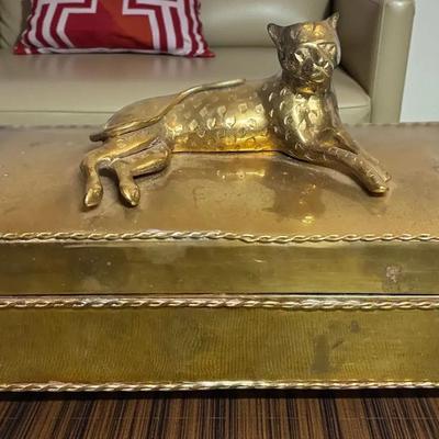 Brass box with a recumbent cheetah figure on the lid