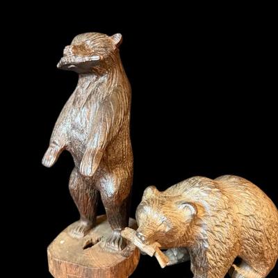 Pair of hand carved german wooden black forest style bears