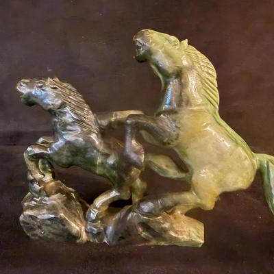 Carved stone horse sculpture