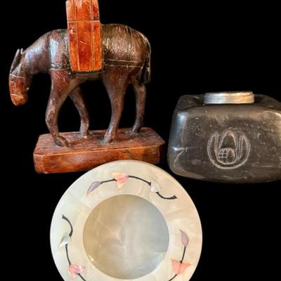 Alabaster & black clay ashtrays & carved wooden candlestick