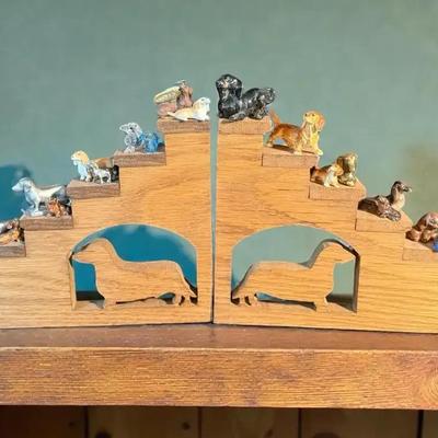 Collection of dachshund dog figurines wall display rack