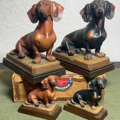 Anri carved wood dachshunds four total