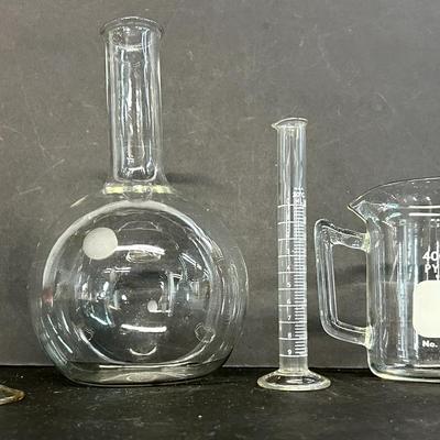 Rare Vintage Pyrex And Other Lab Glassware With Beakers And Flasks Of Varying Sizes
