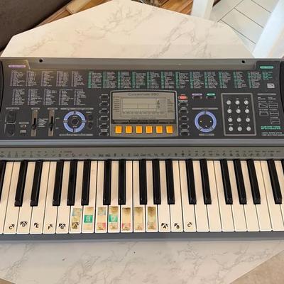 Casio Electronic Keyboard (Model CTK-550) with Built-In Speakers