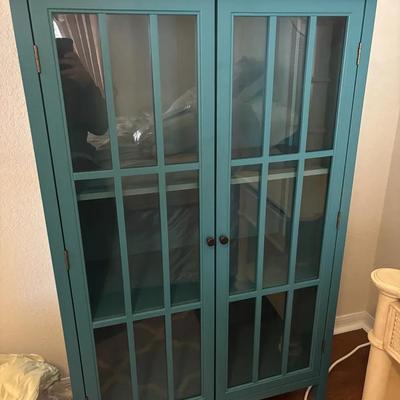 Teal Wood Cabinet with Glass Panel Doors