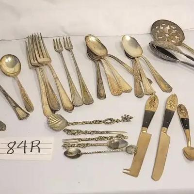 Assorted antique and vintage silver flatware and serving pieces