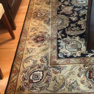 8’ X 10’ Floral Pattern Rug W/ White Fringe Ends