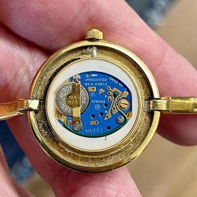 Authentic inside of  vintage Gucci bezel watch with new battery 