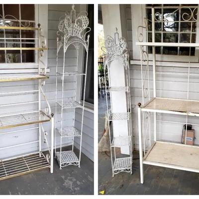 White Metal Shelving Units with Decorative Scrollwork and Brass Accents