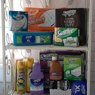 Cleaning Supplies Collection with White Metal Storage Rack, Swiffer System & Vacuum