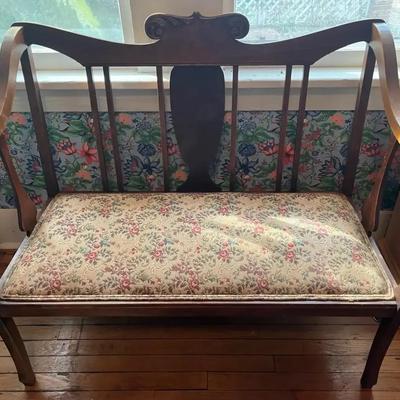 Antique Wooden Settee with Carved Details & Floral Upholstery