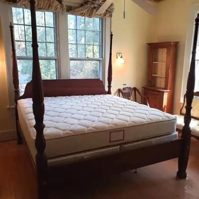 Solid Wood Four-Poster Bed with Tall Turned Posts and Carved Headboard