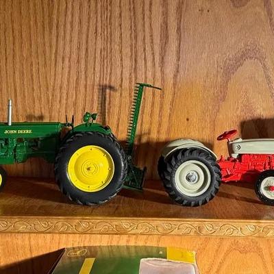 4 Cast Iron Tractors