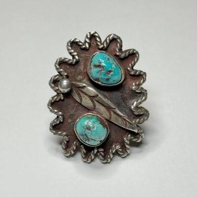 Vintage large Native American Navajo sterling silver and turquoise ring with feather design and rope border, not marked, 12.5g, size 6