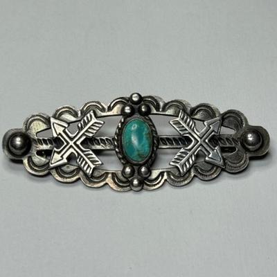 Antique Fred Harvey Era Native American coin silver brooch/pin with a turquoise stone and crossed arrows design, 9.5g