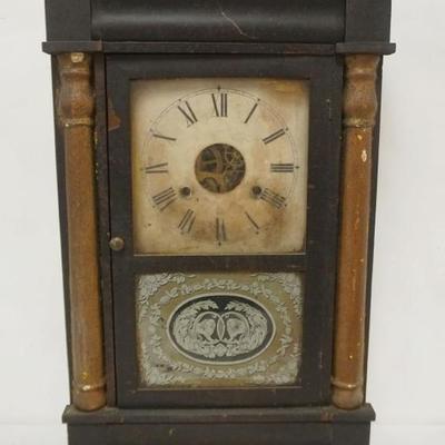 Sale Photo Thumbnail #179: 1179	ANTIQUE SHELF CLOCK W/TURNED HALF COLUMNS & REVERSE PAINTED GLASS DOOR, MISSING HANDS, APPROXIMATELY 5 IN X 15 IN X 25 IN HIGH
