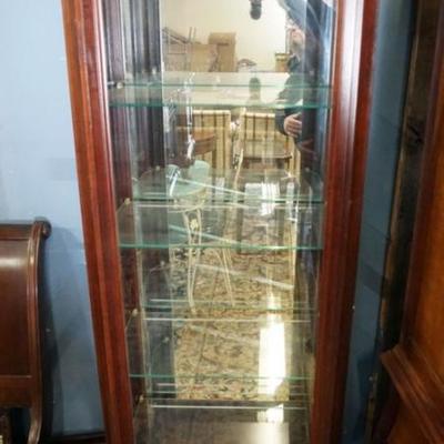 Sale Photo Thumbnail #215: 1215	JASPER CABINET COMPANY *LEGACY* CURIO CABINET WITH ADJUSTABLE GLASS SHELVES AND INTERIOR LIGHT, APPROXIMATELY 29 IN X 16 IN X75 IN H
