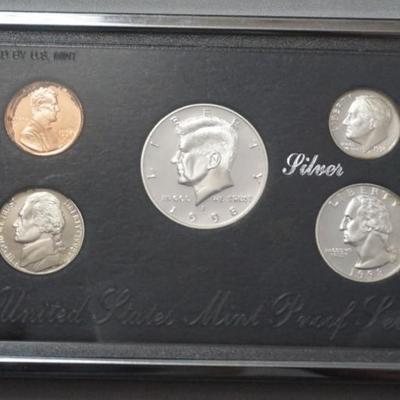 Sale Photo Thumbnail #165: 1165	UNITED STATES MINT PROOF SET WITH SILVER DOLLAR, QUARTER & DIME
