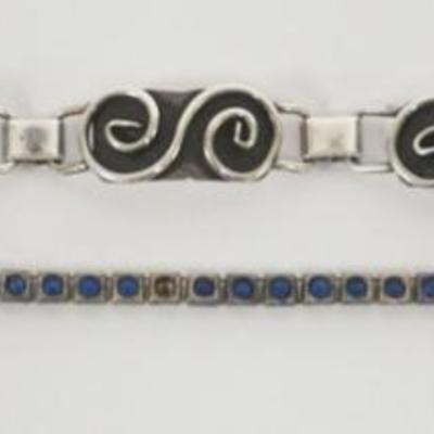 Sale Photo Thumbnail #105: 1105	2 STERLING SILVER BRACELETS, BLUE STONE AS FOUND MARKED PAYCO PAT 3-15-26 MISSING 2 STONES, 1.14 OZT INCLUDING STONES
