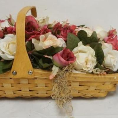 Sale Photo Thumbnail #89: 1089	ASSORTED LONGABERGER BASKETS INCLUDING 2005 LARGE GATHERING BASKET WITH PROTECTOR AND FLORAL INSERT AND 2010 LITTLE LEPRECHAUN BASKET WITH LID, LINER AND PROTECTOR, LARGEST APPROXIMATELY 21 IN X 13 IN X 9 IN H
