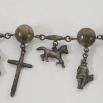 Sale Photo Thumbnail #106: 1106	STERLING SILVER CHARM BRACELET, 1.04 OZT
