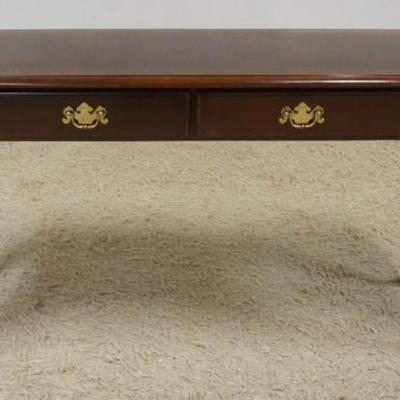 Sale Photo Thumbnail #219: 1219	2 DRAWER SOFA TABLE WITH CABRIOLE LEGS, SOME SUN FADING TO TOP FINISH, APPROXIMATELY 54 IN X 17 IN X29 IN H
