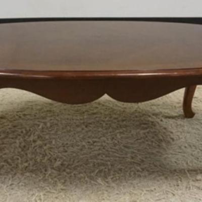 Sale Photo Thumbnail #218: 1218	OVAL COFFEE TABLE, APPROXIMATELY 52 IN X 31 IN X 17 IN H
