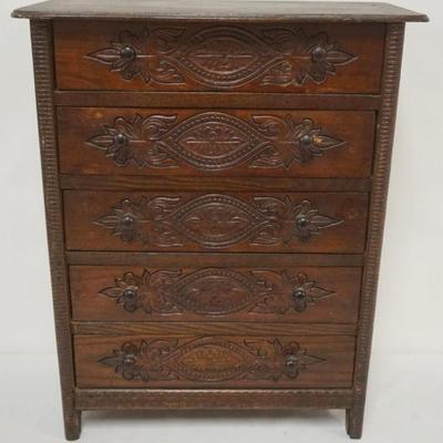 Sale Photo Thumbnail #175: 1175	PRESSED CARVED MINIATURE 5 DRAWER CHEST, APPROXIMATELY 17 IN X 8 IN X 22 IN HIGH
