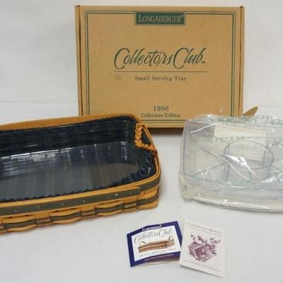 Sale Photo Thumbnail #87: 1087	ASSORTED LONGABERGER BASKETS INCLUDING 1996 J.W. SMALL SERVNG BASKET WITH LINER, PROTECTOR AND BOX, DIVIDED SERVING PROTECTOR AND LID
