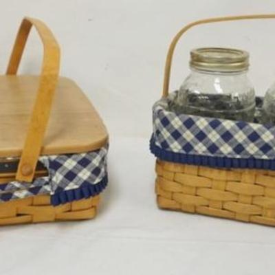 Sale Photo Thumbnail #95: 1095	ASSORTED LONGABERGER BASKETS INCLUDING 2005 BLUE RIBBON PIE BASKET WITH LINER, PROTECTOR AND LID AND 2003 BLUE RIBBON CANNING BASKET WITH LINER, PROTECTOR AND CANNING JARS
