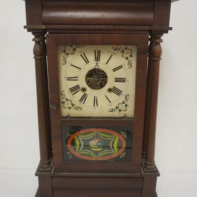 Sale Photo Thumbnail #177: 1177	ANTIQUE SHELF CLOCK W/TURNED COLUMNS & REVERSE PAINTED GLASS DOOR, APPROXIMATELY 16 IN X 5 IN X 26 IN HIGH
