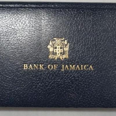 Sale Photo Thumbnail #169: 1169	1976 BANK OF JAMAICA BANK NOTE SET, LTD ED FOLDER SN 0094  TWO DIGIT VERY LOW SERIAL NUMBER
