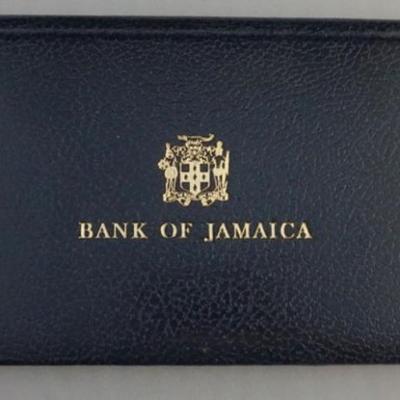 Sale Photo Thumbnail #170: 1170	1976 BANK OF JAMAICA BANK NOTE SET, LTD ED FOLDER SN 0095 TWO DIGIT VERY LOW SERIAL NUMBER
