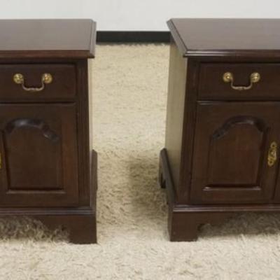 Sale Photo Thumbnail #213: 1213	PAIR OF ETHAN ALLEN CHERRY BEDSIDE STANDS, EACH WITH 1 DRAWER AND 2 DOORS ON HIGH BRACKET FEET, EACH APPROXIMATELY 25 IN X 16 IN X 25 IN H

