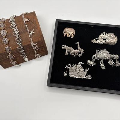 African Animal Charm Bracelets And Noah’s Ark Broaches