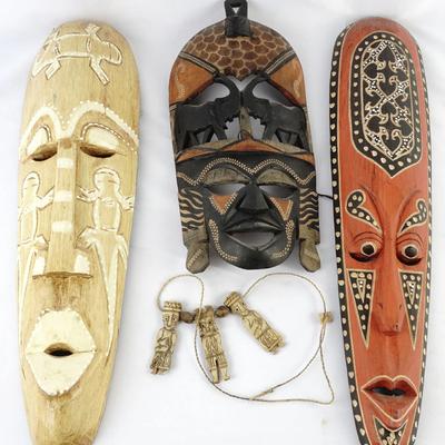 Hand-Carved African Tribal Masks & Toraja Tau Tau Bone Figurines