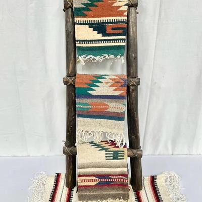 Southwestern-Style Dark Wood Ladder With Small Rugs Decor