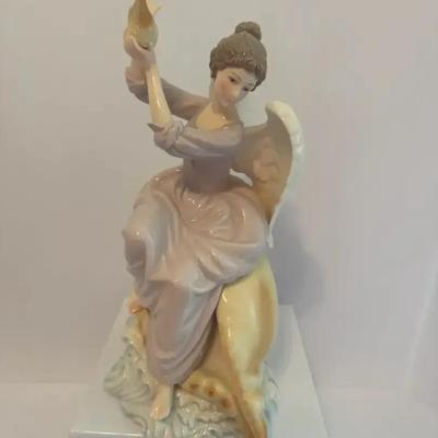 Porcelain Angel Sitting Conch Seashell Figurine