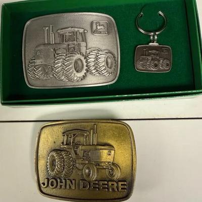 Vintage John Deere tractor belt buckles and a matching keychain