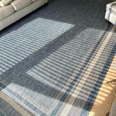 Large Blue Area Rug with Woven Texture and Border Detail