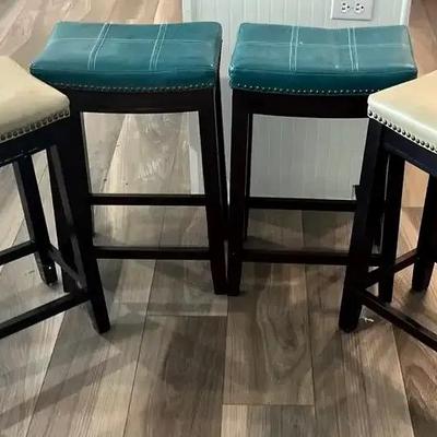 Four Leather-Look Barstools
