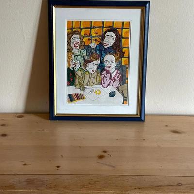 Framed Colorful Artwork Depicting Figures in Social Scene