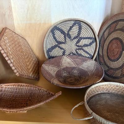 Woven Baskets with Geometric and Floral Patterns