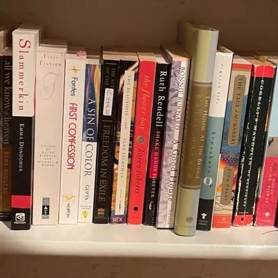 Fiction and Non-Fiction Books on White Shelving