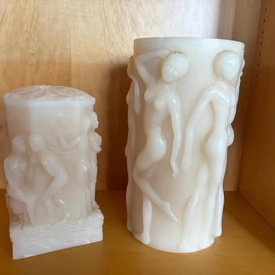 White Sculptural Candle Holders with Figurative Relief Design