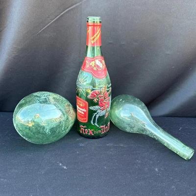 2 vintage handblown glass rounded bottom bottles and German wine bottle 