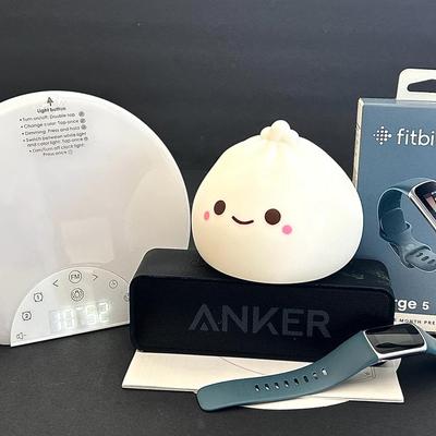 Wake Up Clock, Fitbit Charge 5, Smoko Ambient Light, Anker Bluetooth Speaker