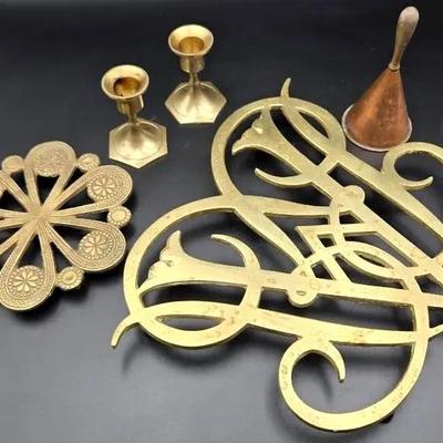 Vintage Brass Home Decor Lot – Trivets, Candlesticks & Hand Bell