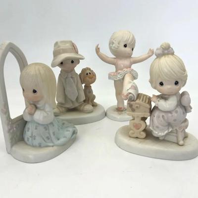 4 Precious Moments Figurines